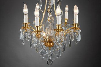 Eight Arm Gilt Bronze Chandelier With Tassels