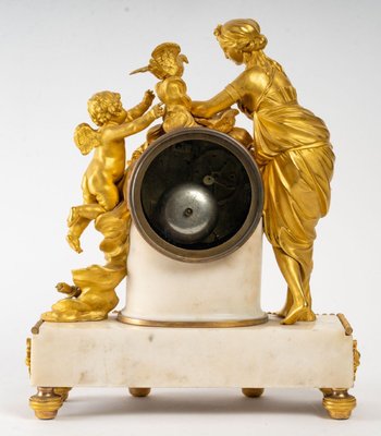 A Clock In Gilt Bronze And White Marble 18th Century
