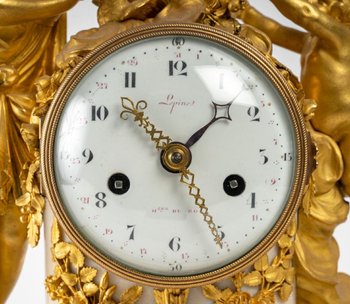 A Clock In Gilt Bronze And White Marble 18th Century