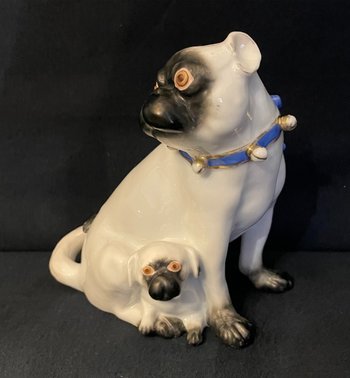 Pug and her little one in porcelain. Samson after Meissen