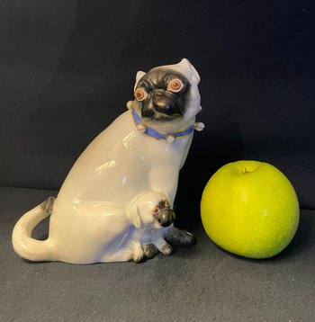Pug and her little one in porcelain. Samson after Meissen