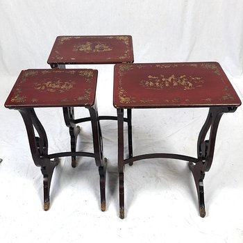 Set of three red lacquered nesting tables with gold decoration in the Asian style, 19th century