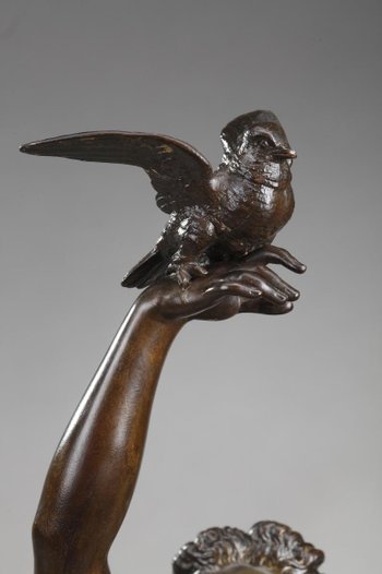 Bronzo "Donna con colombe" di Charles-Alphonse Gumery