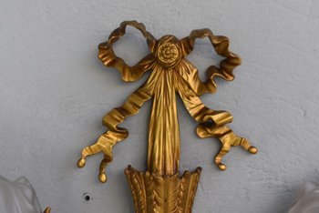             Coppia di lampade da parete in bronzo in stile Luigi XVI