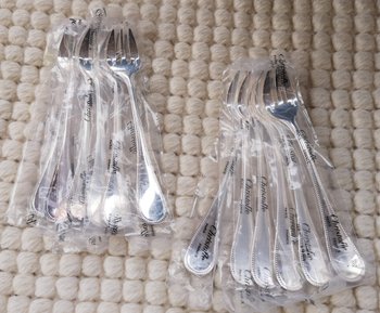 & 2 Christofle oyster forks, "Perles" model, silver plated