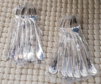 & 2 Christofle oyster forks, "Perles" model, silver plated