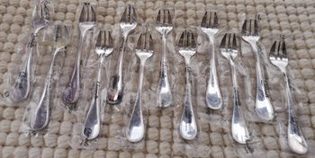 & 2 Christofle oyster forks, "Perles" model, silver plated