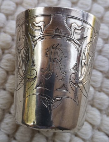 Timpani floral decoration, sterling silver fleur-de-lis, punch neck brace Monogram "RA"