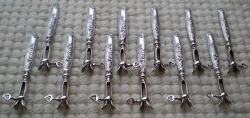Box of 12 ribbed sleeves silver sleeves filled with art nouveau decor
