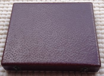 Ecrin de 12 porte-couteaux en métal argenté Saint-Médard (Réf MA 0479)