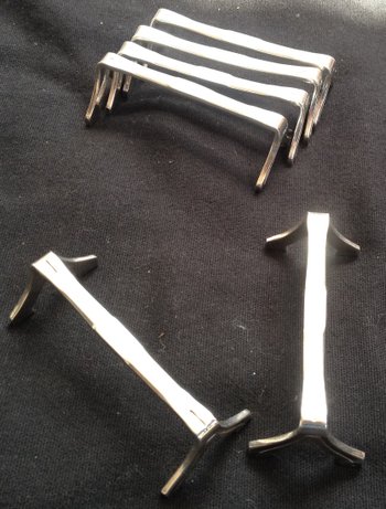 6 versilberte Messerhalter
