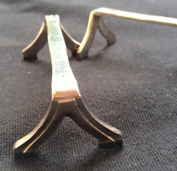 12 versilberte Messerhalter
