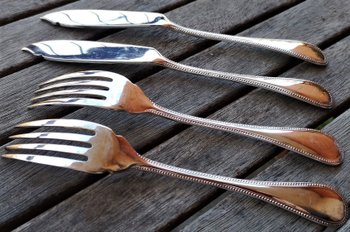 2 individual fish cutlery sets model Perles orfèvrerie Christofle