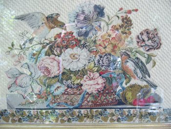 Embroidery framed with a flowered basket and birds, 19th century