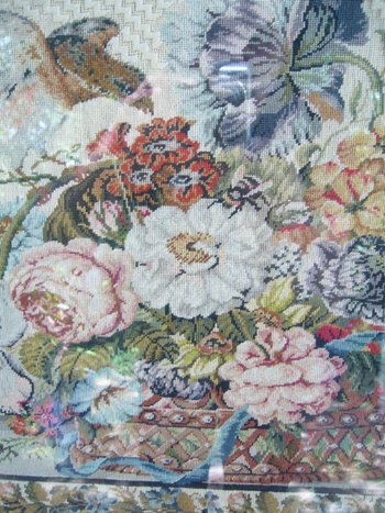 Embroidery framed with a flowered basket and birds, 19th century