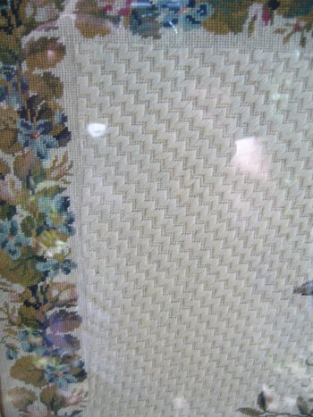 Embroidery framed with a flowered basket and birds, 19th century
