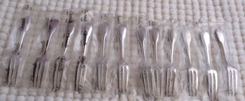 12 Christofle "Versailles" silver cake forks in blister pack (ref MA 0527)