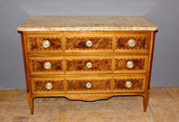 Louis XVI period chest of drawers in walnut and marquetry About 1780