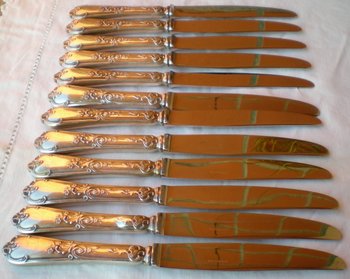 12 Louis XV style table knives