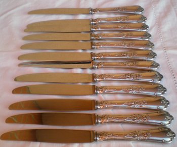12 Louis XV style table knives