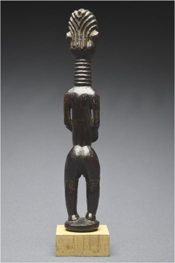 Democratic Republic of Congo (ex Zaire), Ndengese people, Mid 20th century, Ancient anthropomorphic fetish in wood with shiny patina