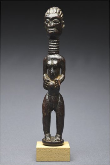 Democratic Republic of Congo (ex Zaire), Ndengese people, Mid 20th century, Ancient anthropomorphic fetish in wood with shiny patina