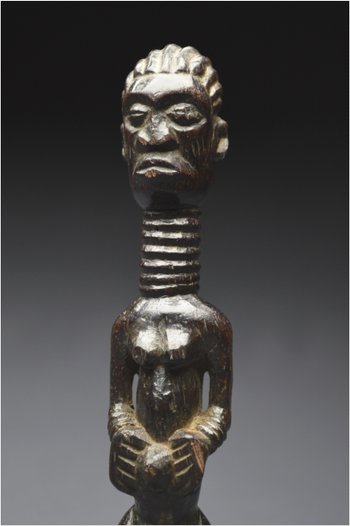 Democratic Republic of Congo (ex Zaire), Ndengese people, Mid 20th century, Ancient anthropomorphic fetish in wood with shiny patina