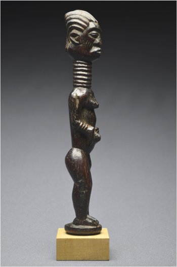 Democratic Republic of Congo (ex Zaire), Ndengese people, Mid 20th century, Ancient anthropomorphic fetish in wood with shiny patina