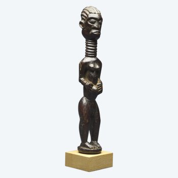 Democratic Republic of Congo (ex Zaire), Ndengese people, Mid 20th century, Ancient anthropomorphic fetish in wood with shiny patina