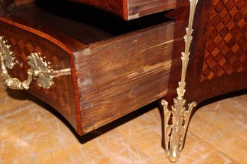 Cassettiera a balestra Luigi XIV con intarsio a cubetti