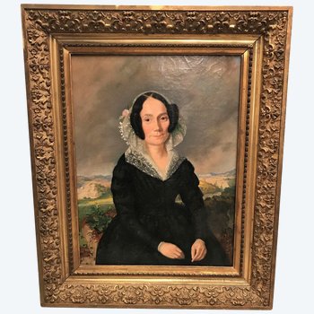 Oil on canvas portrait of a woman wearing a lace headdress Restoration period 19th century