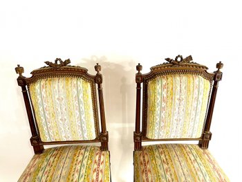 Paire de chaises style Louis XVI avec flambeaux