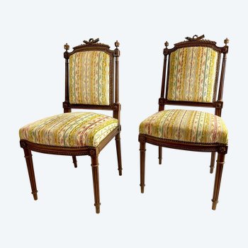 Paire de chaises style Louis XVI avec flambeaux