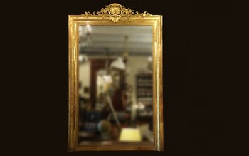 Large wooden mirror and gilded stucco 19th century