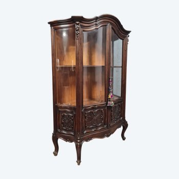 Louis XV style bookcase entirely curved in solid walnut around 1900