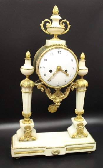 Late Louis XVI Period Portico Clock In Marble And Gilt Bronze