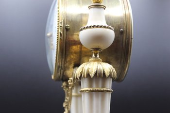 Late Louis XVI Period Portico Clock In Marble And Gilt Bronze