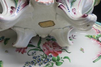 Important soup tureen and its presentation dish in Eastern earthenware