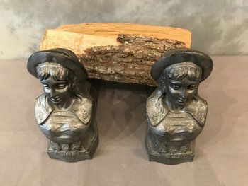 Pair of gray cast iron andirons, late 19th century