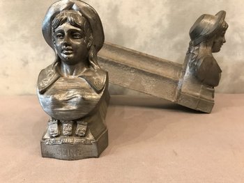 Pair of gray cast iron andirons, late 19th century
