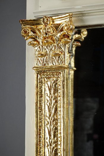 Grande specchio Trumeau in legno e stucco dorato di epoca Impero, XIX secolo