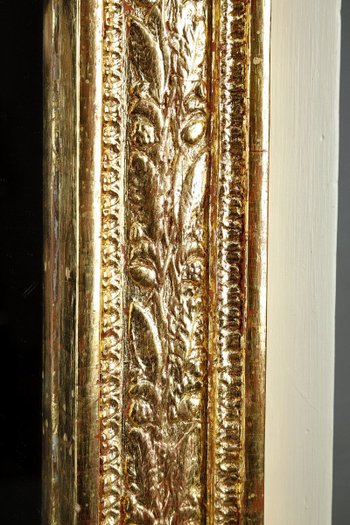 Grande specchio Trumeau in legno e stucco dorato di epoca Impero, XIX secolo