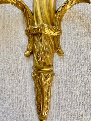 Paar Wandleuchten aus vergoldeter Bronze