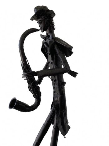 Iron Sculptures Of The Artist Jean Alexandre Delattre The Man With Flowers And The Man With Saxo.