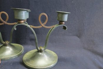 Pair of wrought iron design candle holders