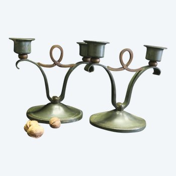 Pair of wrought iron design candle holders