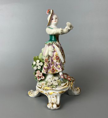 A mid 18thc Bow "New Dancers" figure on a rococo footed base 1756-65