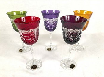 Set of five colored cut crystal stemware