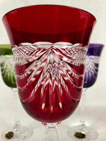 Set of five colored cut crystal stemware