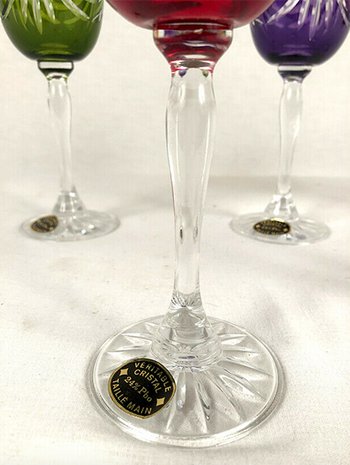 Set of five colored cut crystal stemware